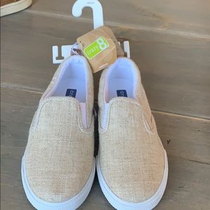 Boys slip on shoes. Tan and white size 12.
